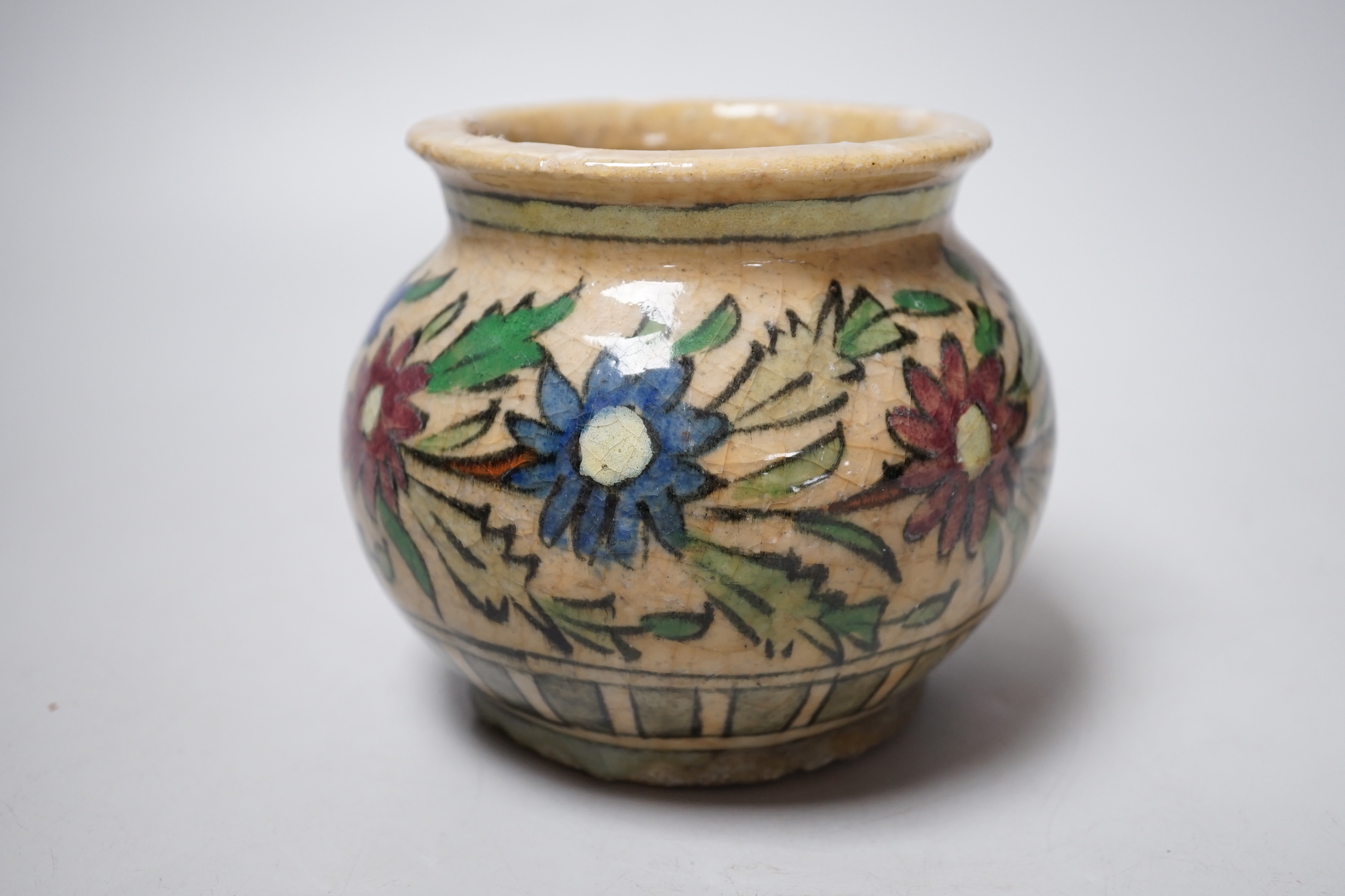 A Persian Fritware pottery jar, Qajar dynasty,12cm high